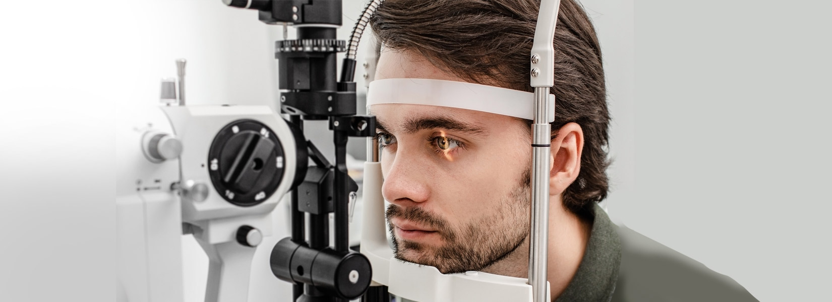 young man during eye exam in Warsaw