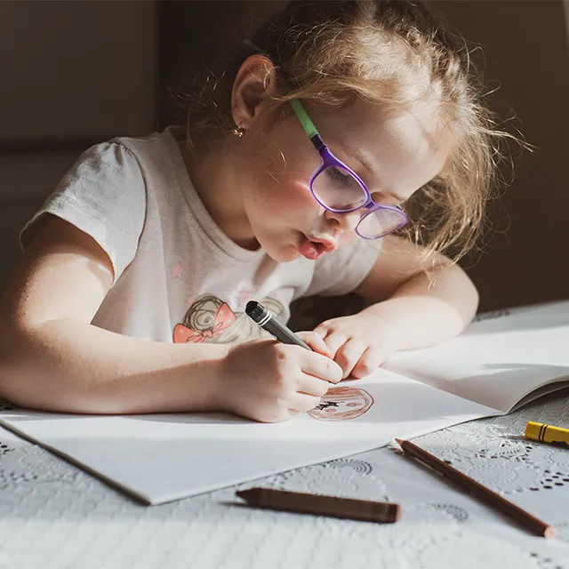 young girl doing homework